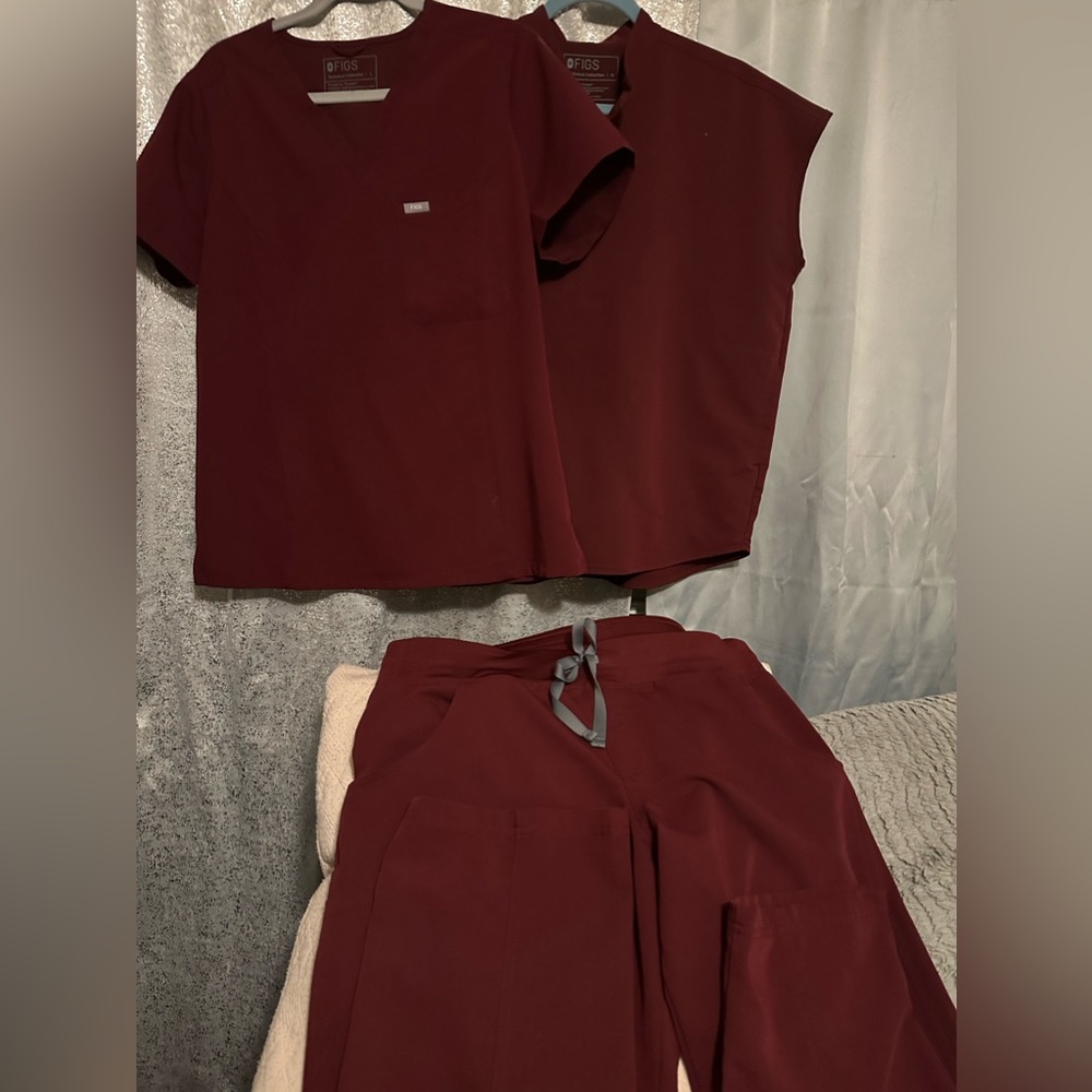 Figs SCRUBS size large .  Price is for one top and one bottom.  Pants are KADE